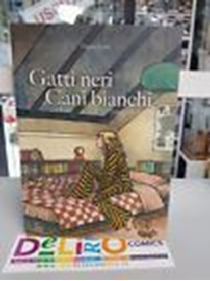 Immagine di GATTI NERI CANI BIANCHE LUNGO LA STRADA
